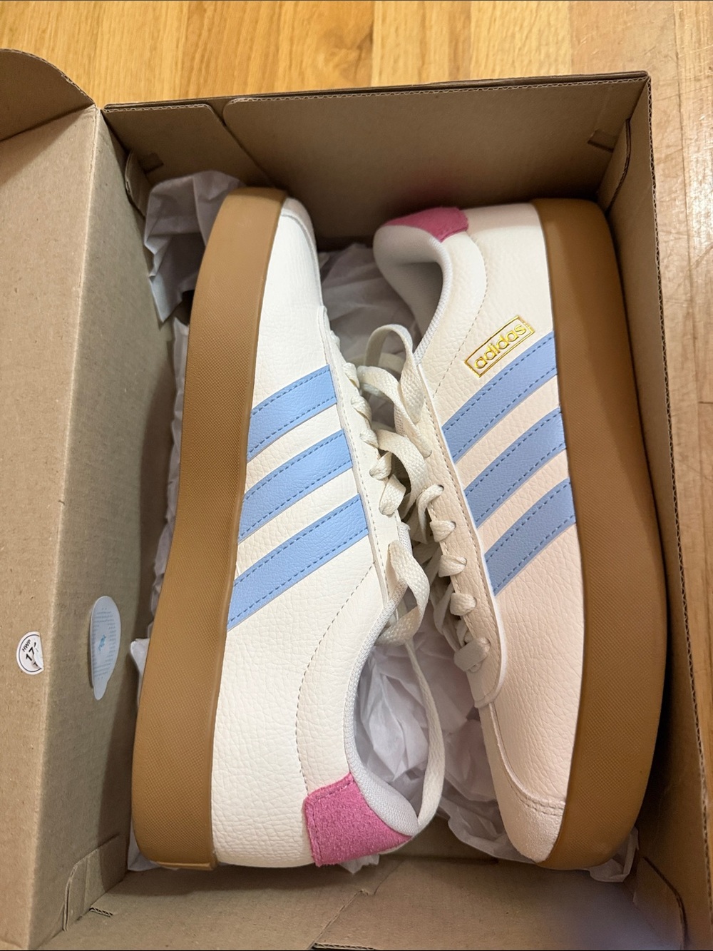 adidas Women’s White Leather Sneakers with Light Blue Stripes and Pink Heel Tab